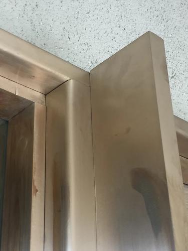 Iron stair railing with twisted balusters