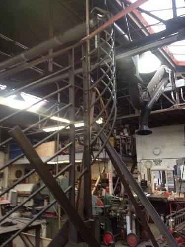 Ornamental iron railing for curved staircase