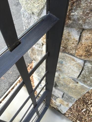 Iron picket railing for concrete stairs
