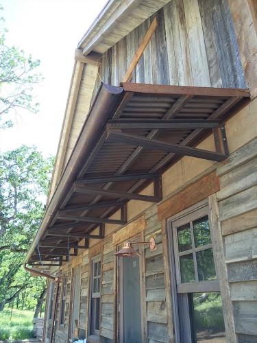 Custom welded metal railing with unique design