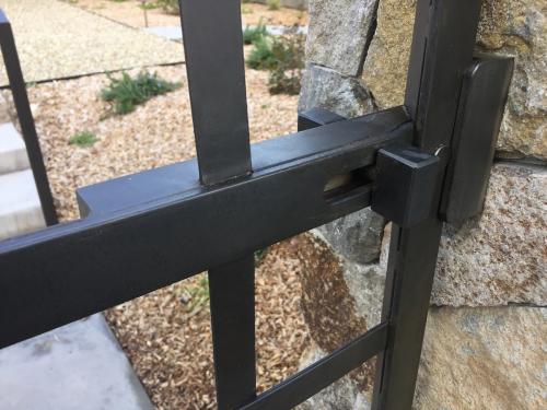 Custom iron gate for residential driveway