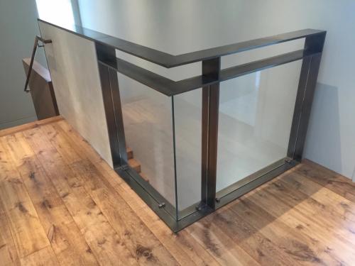 Exterior iron railing for concrete steps