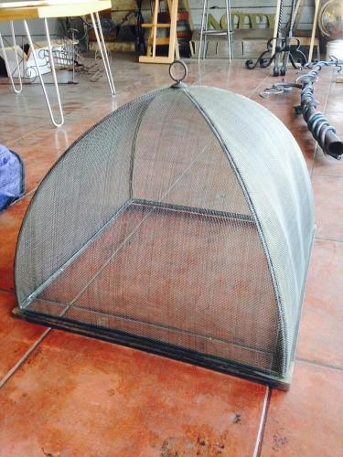 Decorative iron railing with basket weave pattern