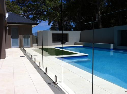 Frameless glass railing for modern balcony