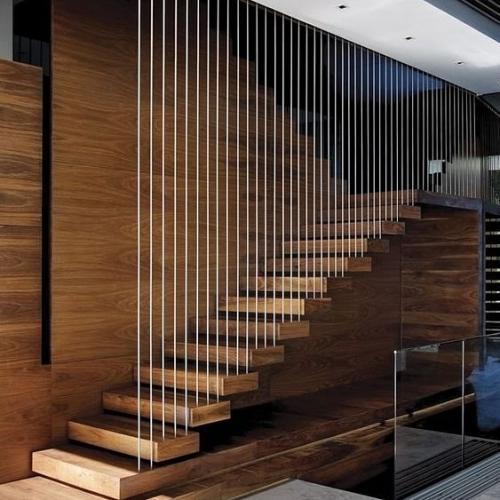 Curved glass railing for spiral staircase