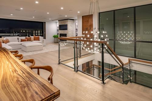 Glass railing with black metal frame accents