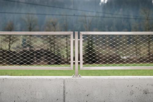 Glass railing for basement staircase