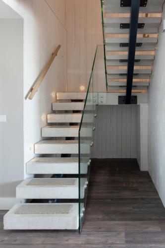 Glass railing for outdoor porch area